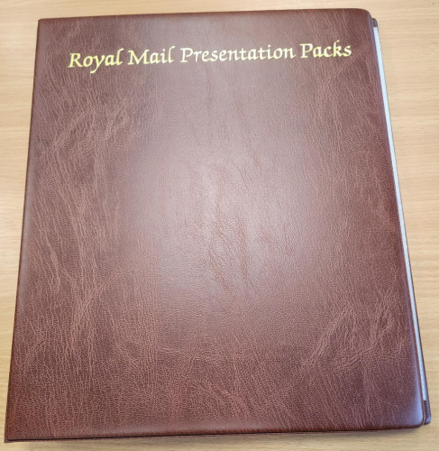 Brown Royal Mail Presentation Packs Album with 18 pages leatherette page